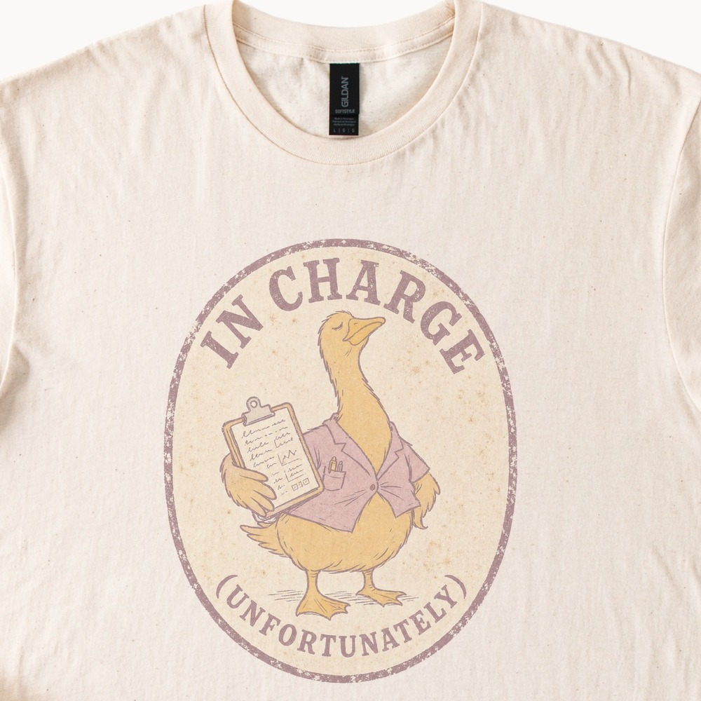 In Charge (Unfortunately) Goose Holding Clipboard Badge Tee